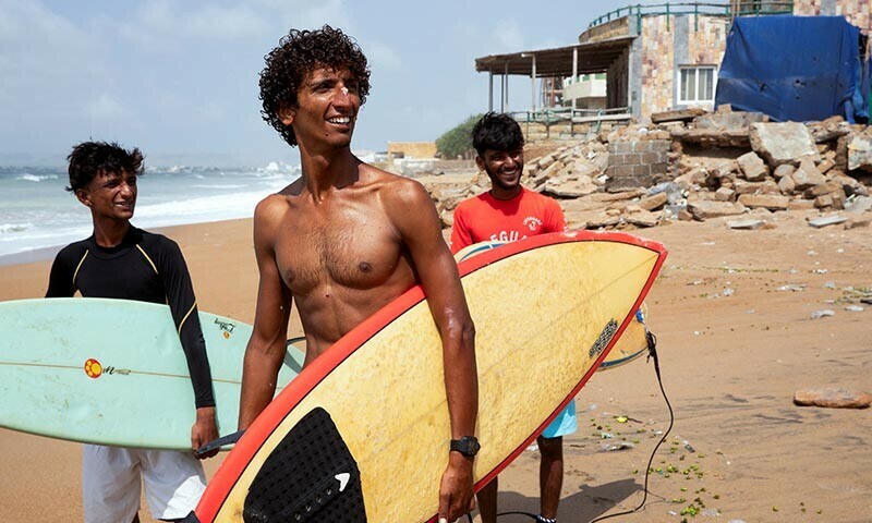 On Karachi’s coast, a group of surfers chases waves and their dreams