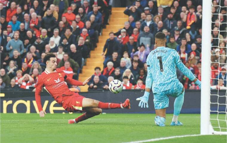 Liverpool reclaim EPL top spot as City survive Wolves scare