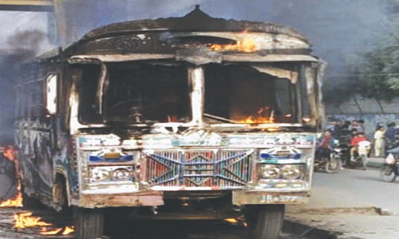 Mob torches bus after Karachi woman dies in accident