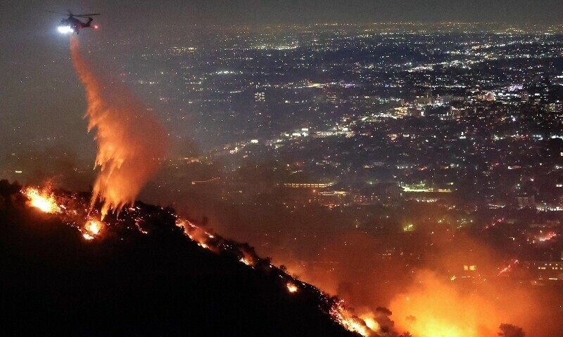 Whole streets burn as fires rage around Los Angeles